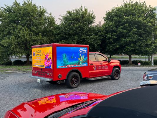 Powerful Toyota truck ready for an off-road adventure in a woodland setting.
